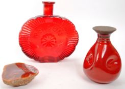 RED SUN BOTTLE GLASS ' POISON ' BOTTLE & GLAZED MOULDED POTTERY VASE