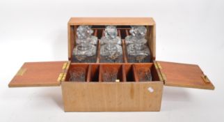 MID CENTURY TANTALUS WITH THREE CRYSTAL DECANTERS & GLASSES
