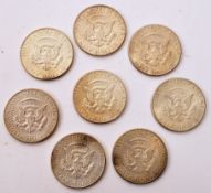 EIGHT 1964 USA HALF DOLLAR COINS