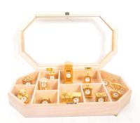 COLLECTION OF TWELVE MINIATURE NOVELTY CLOCKS