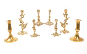 COLLECTION OF ART NOUVEAU STYLE BRASS CANDLESTICKS