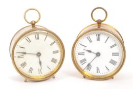TWO EARLY 20TH CENTURY BRASS CASED ALARM CLOCKS
