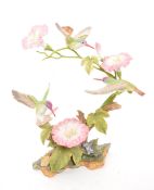 MARURI STUDIO - LIMITED EDITION BISQUE PORCELAIN HUMMINGBIRD FIGURE