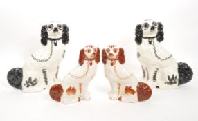 TWO PAIRS OF CERAMIC STAFFORDSHIRE SPANIEL DOGS