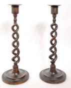 PAIR OF BRASS OPEN BARLEY TWIST CANDLESTICKS