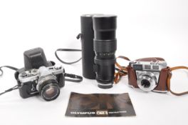 OLYMPUS - 1970S OM-1 35MM SLR CAMERA