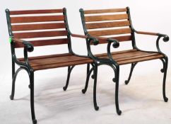 PAIR OF CAST IRON GARDEN CHAIRS