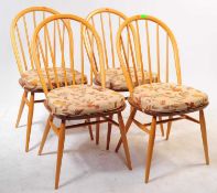 ERCOL - SET OF FOUR LATE 20TH CENTURY HOOP BACK DINING CHAIRS