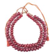 TWO RUBY FACETED COMPOSITE STONE NECKLACES