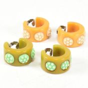 TWO PAIRS OF VINTAGE BAKELITE POLKA DOT HOOP EAR CLIPS