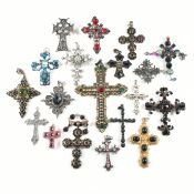 COLLECTION OF NINETEEN GEM SET CROSS PENDANTS