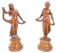 PAIR OF BRONZE FIGURES IN THE FORM OF LADIES