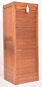 A MID CENTURY FRENCH OAK TAMBOUR FRONTED FILING CABINET WITH KEY