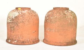 PAIR OF 20TH CENTURY WEATHERED TERRACOTTA RHUBARB / KALE FORCES
