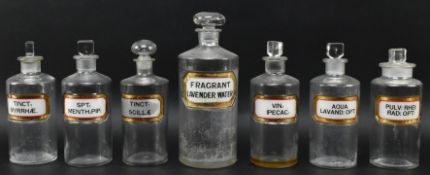 SEVEN VINTAGE 20TH CENTURY GLASS APOTHECARY / CHEMISTS BOTTLES WITH LABELS