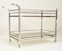 RETRO MID CENTURY ITALIAN SMOKED GLASS AND CHROME TROLLEY