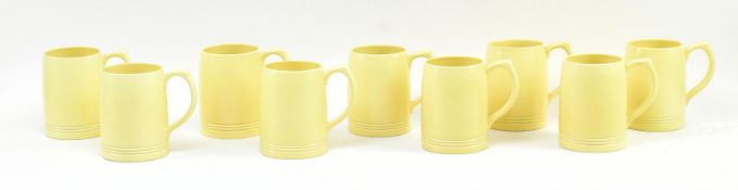 KEITH MURRAY FOR WEDGWOOD - SET OF NINE CERAMIC DESIGN BEER MUGS