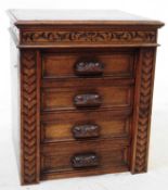 EARLY 20TH CENTURY CARVED OAK WELLINGTON CHEST OF DRAWERS