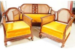 CIRCA 1930S WALNUT BERGERE THREE-PIECE SUITE