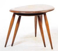 TWO MID CENTURY ERCOL PEBBLE NESTING TABLES