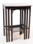 EARLY 20TH CENTURY EBONISED NEST OF TABLES