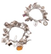 TWO SILVER CHARM BRACELETS WITH SILVER & WHITE METAL CHARMS
