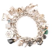 HALLMARKED SILVER CHARM BRACELET WITH HEART PADLOCK CLASP