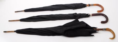 THREE EARLY 20TH - MID CENTURY UMBRELLA PARASOLS