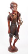 VINTAGE 20TH CENTURY HARD CARVED WOODEN AFRICAN HUNTSMAN