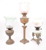 THREE VICTORIAN OIL LAMPS & SHADES