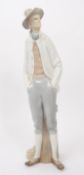 LLADRO HANDPAINTED PORCELAIN FIGURE OF MAN IN HAT AND ROPE