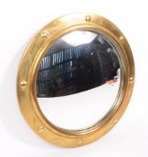 VINTAGE MID CENTURY CONVEX BRASS MIRROR
