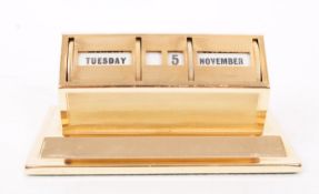 MID CENTURY GILT METAL PERPETUAL CALENDAR