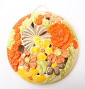 CLARICE CLIFF - 20TH CENTURY FLORAL WALL PLAQUE