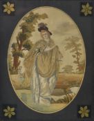GEORGE III SILK NEEDLEWORK PICTURE OF A LADY IN LANDSCAPE