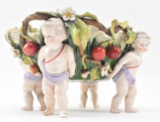 GERMAN 19TH CENTURY HAND PAINTED PORCELAIN CHERUB BASKET