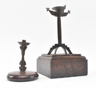 TWO ARTS & CRAFTS COPPER MOUNTED ON WOOD CANDLE HOLDERS