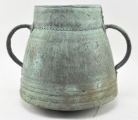 18TH CENTURY PERSIAN HAMMERED COPPER TWIN HANDLED VESSEL