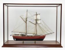 EARLY 20TH CENTURY HAND BUILT MODEL BOAT IN GLAZED DISPLAY CABINET