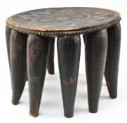 NIGERIAN TRIBAL CARVED HARDWOOD NUPE STOOL WITH ELEVEN LEGS