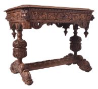 19TH CENTURY CARVED OAK WRITING TABLE DESK