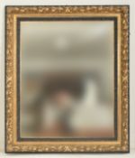 LARGE 19TH CENTURY GILT AND EBONISED MIRROR