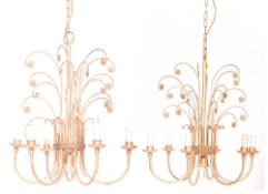PAIR OF HOLLYWOOD REGENCY STYLE GILDED METAL SIX ARM CHANDELIERS
