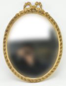 FRENCH INSPIRED 20TH CENTURY GILTWOOD OVAL MIRROR