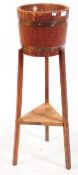 EARLY 20TH CENTURY OAK WINE STAND