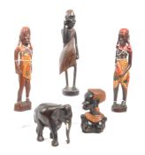 COLLECTION OF WOODEN CARVED TRIBAL FIGURES