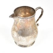 A 1930S HALLMARKED SILVER MILK CREAMER JUG