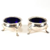 PAIR OF SILVER HALLMARKED BLUE GLASS LINED TABLE SALTS