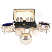 PAIR OF GEORGE V HALLMARKED TABLE SALTS & COLLECTION OF NAPKIN RINGS TBV