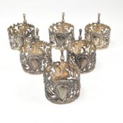 VICTORIAN HALLMARKED SILVER SET OF SIX ROCOCO CUP HOLDERS